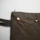 Bottle green leather purse with studs