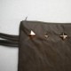 Bottle green leather purse with studs