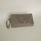Grey suede clutch bag with flap