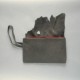 Grey suede clutch bag with flap