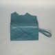 Blue leather purse with flap