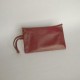Burgundy leather clutch with flap