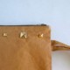 Natural leather purse with studs
