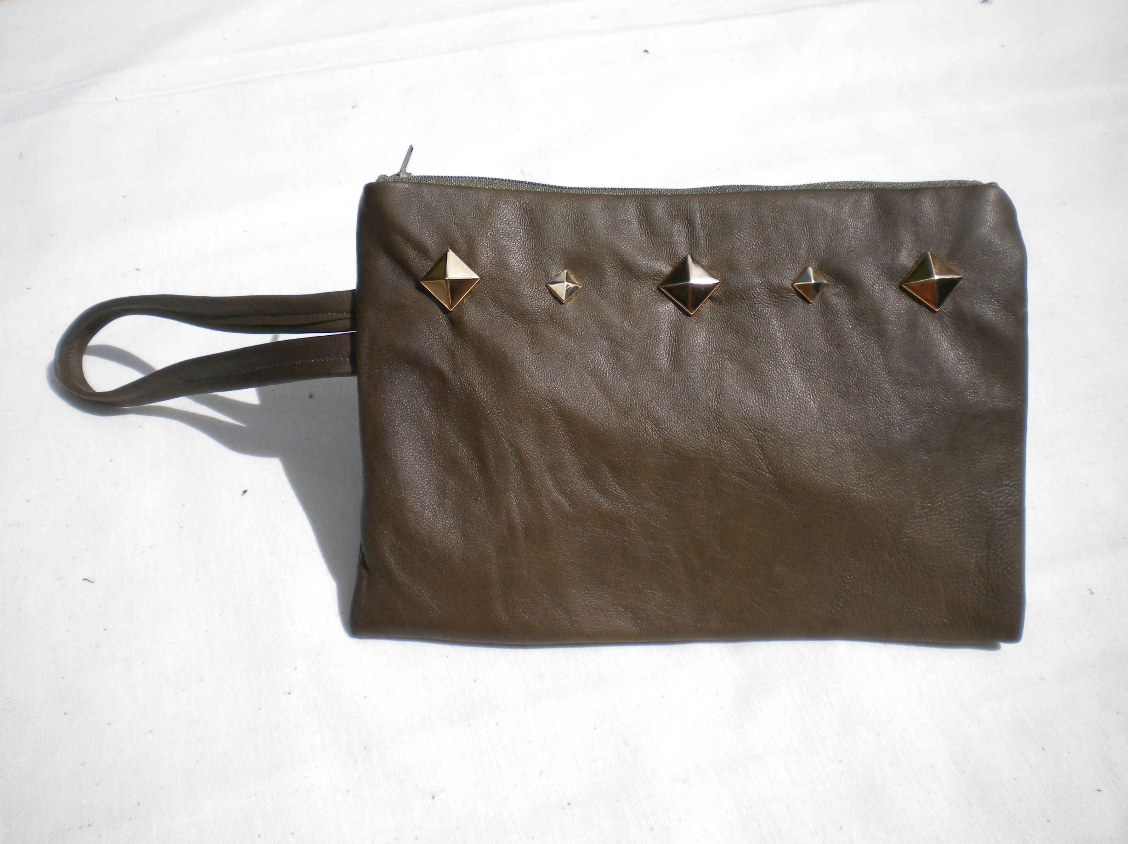  Bottle green leather clutch with studs